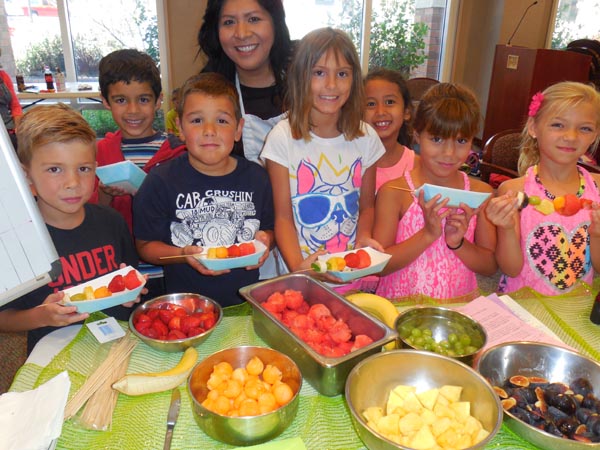 The Wellness Kitchen encourages kids to, "eat a rainbow."