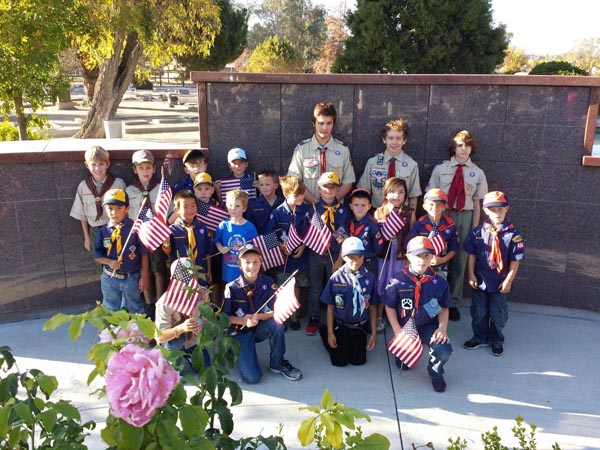 Cub-Scouts-and-Boy-Scouts-from-Templeton-Troop-and-Pack-434-Decorating-Graves-of-Veterens-in-Templeton