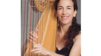 Harpist Marcia Dickstein. Photo credit credit to SLO Symphony.